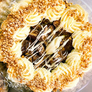 White chocolate snickers cheesecakes - Made by Mama's Desserts